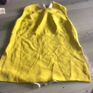 Kaufmanfranco size 6/42 bright yellow silk top.